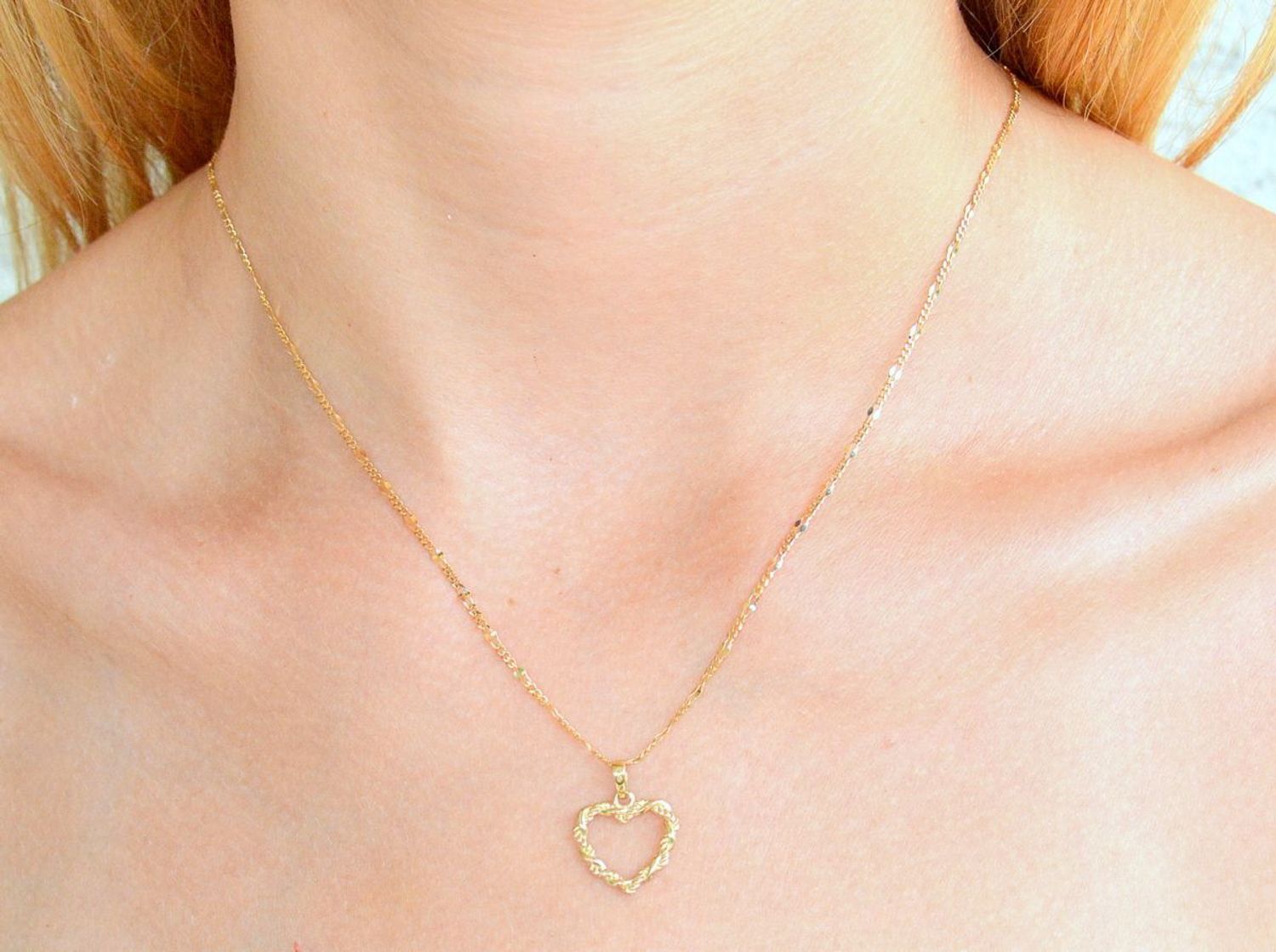 Złota zawieszka 375 plecione serduszko ZA 6795A 375. Złota zawieszka damska. Złota zawieszka serce próby 375. Złota zawieszka damska. Wisiorek serce. Złota zawieszka na prezent..jpg